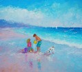 garçon et fille avec Chien sur la plage